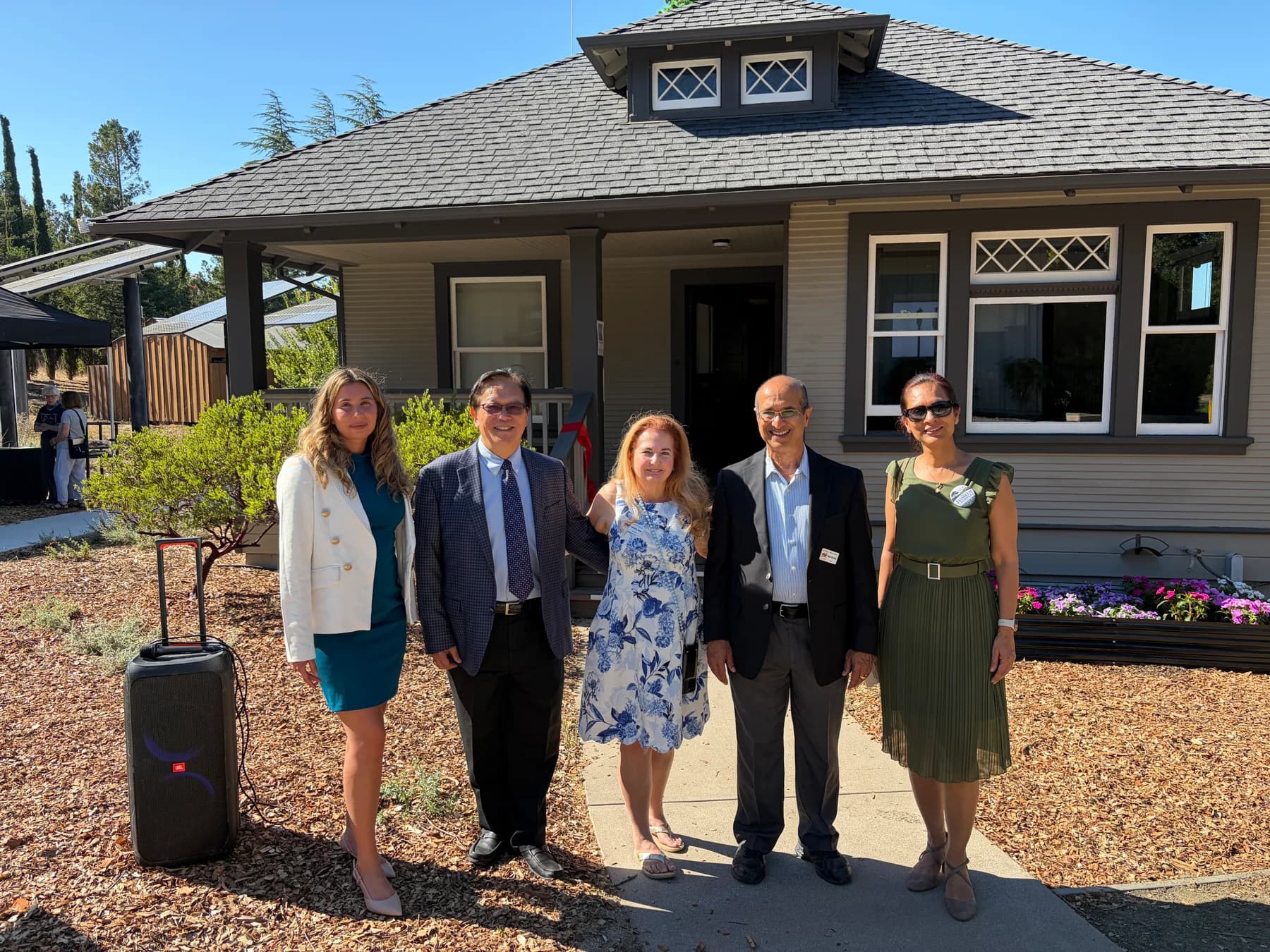 Jasmeen Pombra with local officials and the project manager at the Heritage House ribbon-cutting in Los Altos Hills