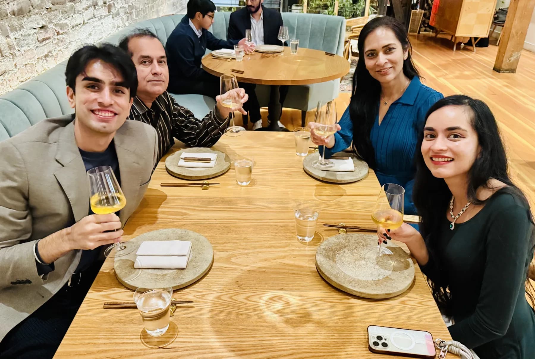 Jasmeen and her family sharing a meal together